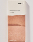 A chocolate bar in brown and white packaging on a white background that reads, "MAST Organic Dark Chocolate 70% Cacao"