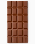 A smooth, rectangular milk chocolate bar divided into a grid of raised square segments, displayed on a white background. The surface of the chocolate is clean and even, with a rich brown color