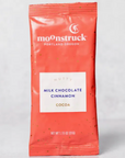 Nutty Milk Chocolate Cinnamon Cocoa." The packaging is in a reddish-orange color with white and blue text. The label highlights the flavor, "Milk Chocolate Cinnamon," with a "Nutty" descriptor and the product type "Cocoa" in a smaller font. The packaging indicates that it contains 1.15 oz (31.6g) of the product. Moonstruck Chocolate Co. is based in Portland, Oregon, as indicated at the top of the packet