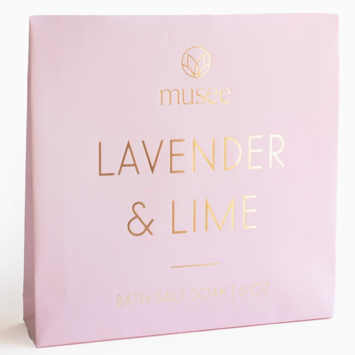 lavender & lime musee 6 oz light lavender packaging behind white background. 