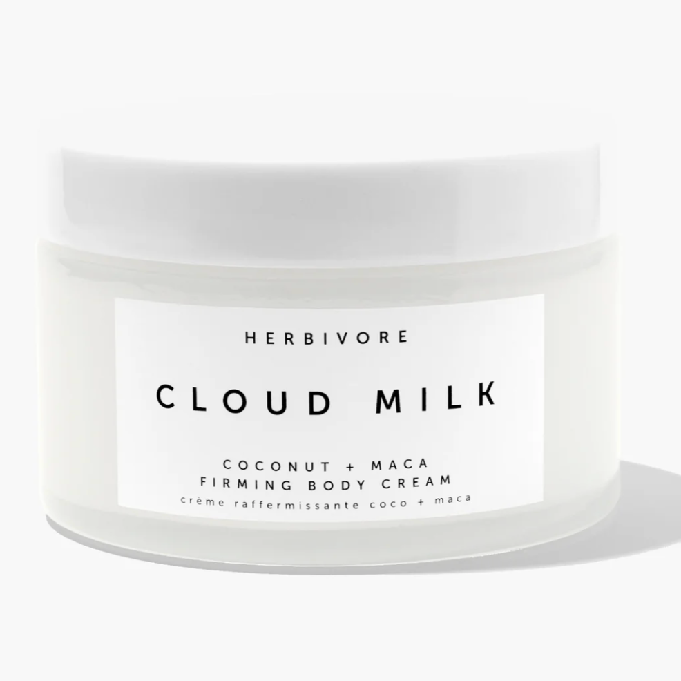 HERBIVORE CLOUD MILK- WHITE PACKAGING ON A WHITE BACKGROUND, THE WRITING IS IN BLACK ON THE CLOUD MILK.