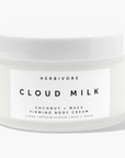 HERBIVORE CLOUD MILK- WHITE PACKAGING ON A WHITE BACKGROUND, THE WRITING IS IN BLACK ON THE CLOUD MILK.