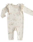 A baby romper with a soft, cream-colored base featuring a delicate floral print in pastel shades of pink, yellow, and green. The romper has long sleeves and charming ruffle details running from the shoulders down to the chest. It includes snap closures along the inner legs for easy diaper changes. The overall design is light, elegant, and perfect for a cozy yet stylish outfit for babies.






