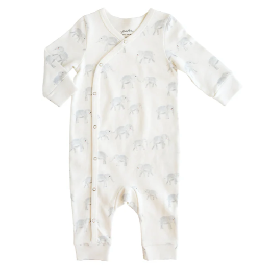 A cream-colored baby romper with long sleeves, featuring a wrap-front design secured by snap buttons that run diagonally from the neckline down the leg. The romper is adorned with a soft gray elephant print, adding a playful and cozy touch. The cuffs at the wrists and ankles provide a snug fit, making it both practical and comfortable for babies. 