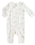 A cream-colored baby romper with long sleeves, featuring a wrap-front design secured by snap buttons that run diagonally from the neckline down the leg. The romper is adorned with a soft gray elephant print, adding a playful and cozy touch. The cuffs at the wrists and ankles provide a snug fit, making it both practical and comfortable for babies. 