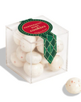 clear candy cube filled with white peppermint balls with specks of red