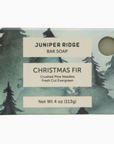 BAR SOAP WITH TREES ON THE PACKAGING. THE SCENT IS CHRISTMAS FIR AND THE BRAND IS JUNIPER RIDGE