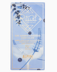 Front view of a chocolate bar packaging from Ritual Chocolate with a lavender and juniper theme. The label reads 'Gin Juniper Lavender Chocolate - Barrel Aged Alpine Distilling Gin with Juniper Lavender - Dark Chocolate - 70% Cacao.' The design includes illustrations of lavender sprigs, juniper berries, and elegant gold accents