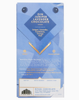 Back view of the Ritual Chocolate Gin Juniper Lavender Chocolate packaging. The label highlights tasting notes of 'Juniper, Lavender, Cardamom, Orange Peel.' It also lists the ingredients, nutritional facts, and product information, including that it is vegan and manufactured in Park City, Utah, with a blue and gold design featuring botanical illustrations