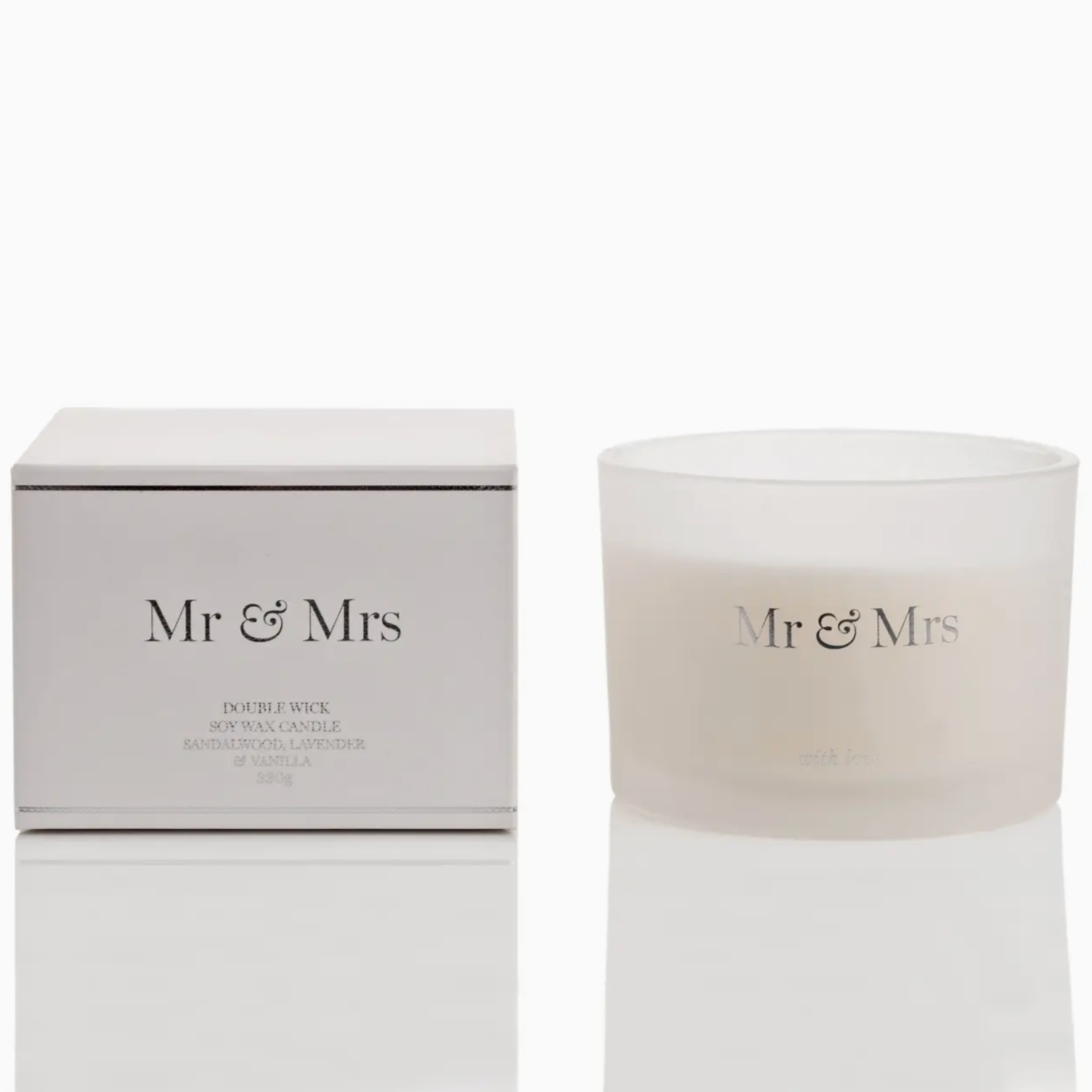 MR AND MRS CANDLE WITH LOVE NEXT TO THE BOX IT COMES IN, THE BOX IS WHITE WITH SILVER AND BLACK DECALS
