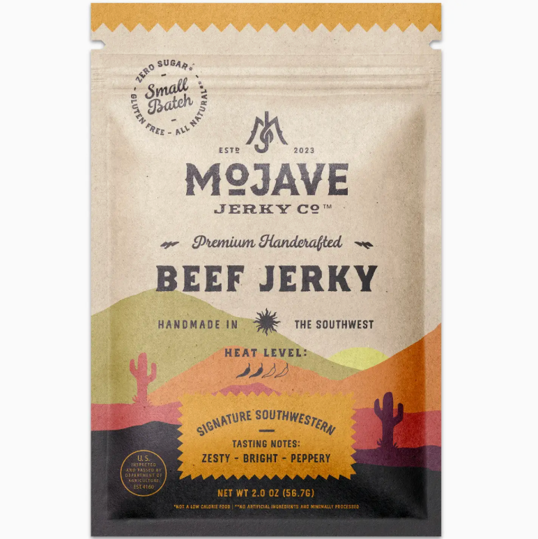 Light brown bag of Beef Jerky, with desert painting on the bag