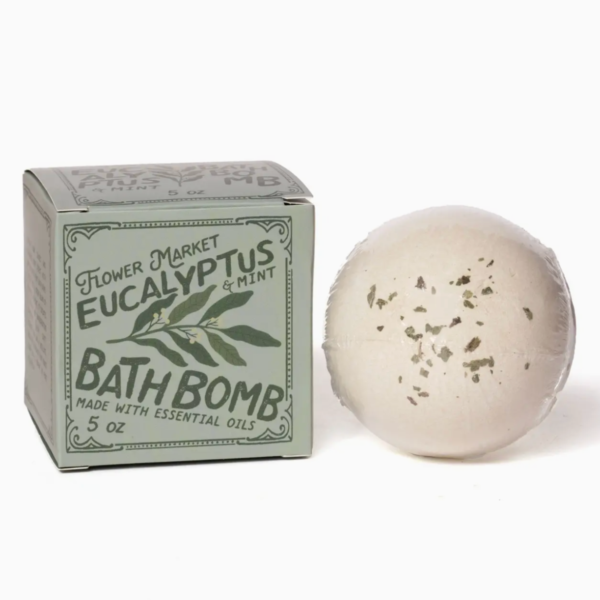Eucalyptus and mint bath bomb with packaging on a white background