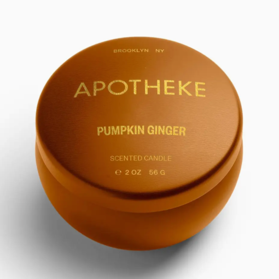 Brown scented candle container with 'Apotheke' branding on a white background