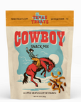 Packaging of Texas Treats Cowboy Snack Mix with a cowboy on a horse illustration.