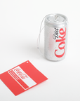 Coca-Cola can and packaging on a white background