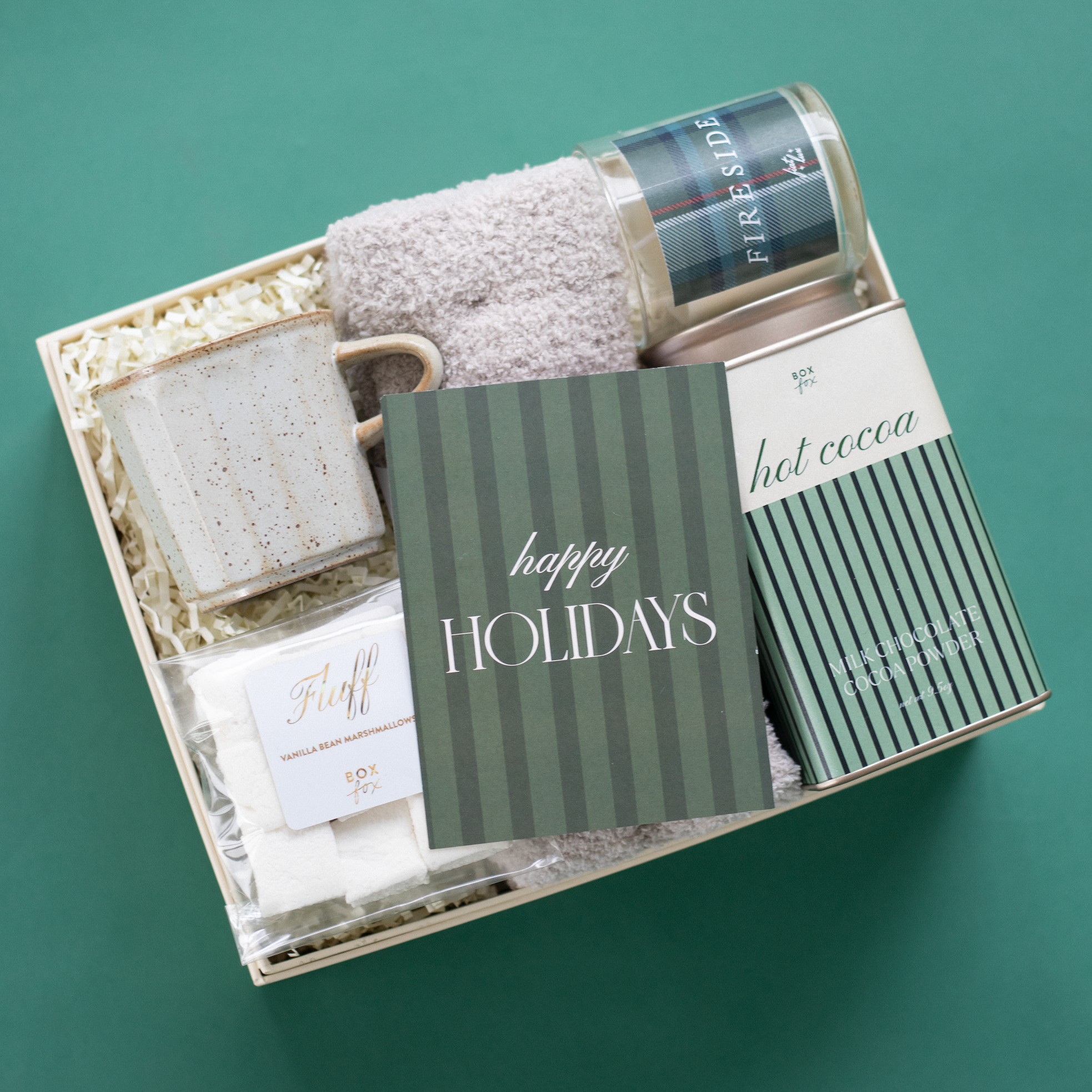 Gift set with bath products on a green background