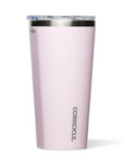 Pink tumbler with silver rim on a white background