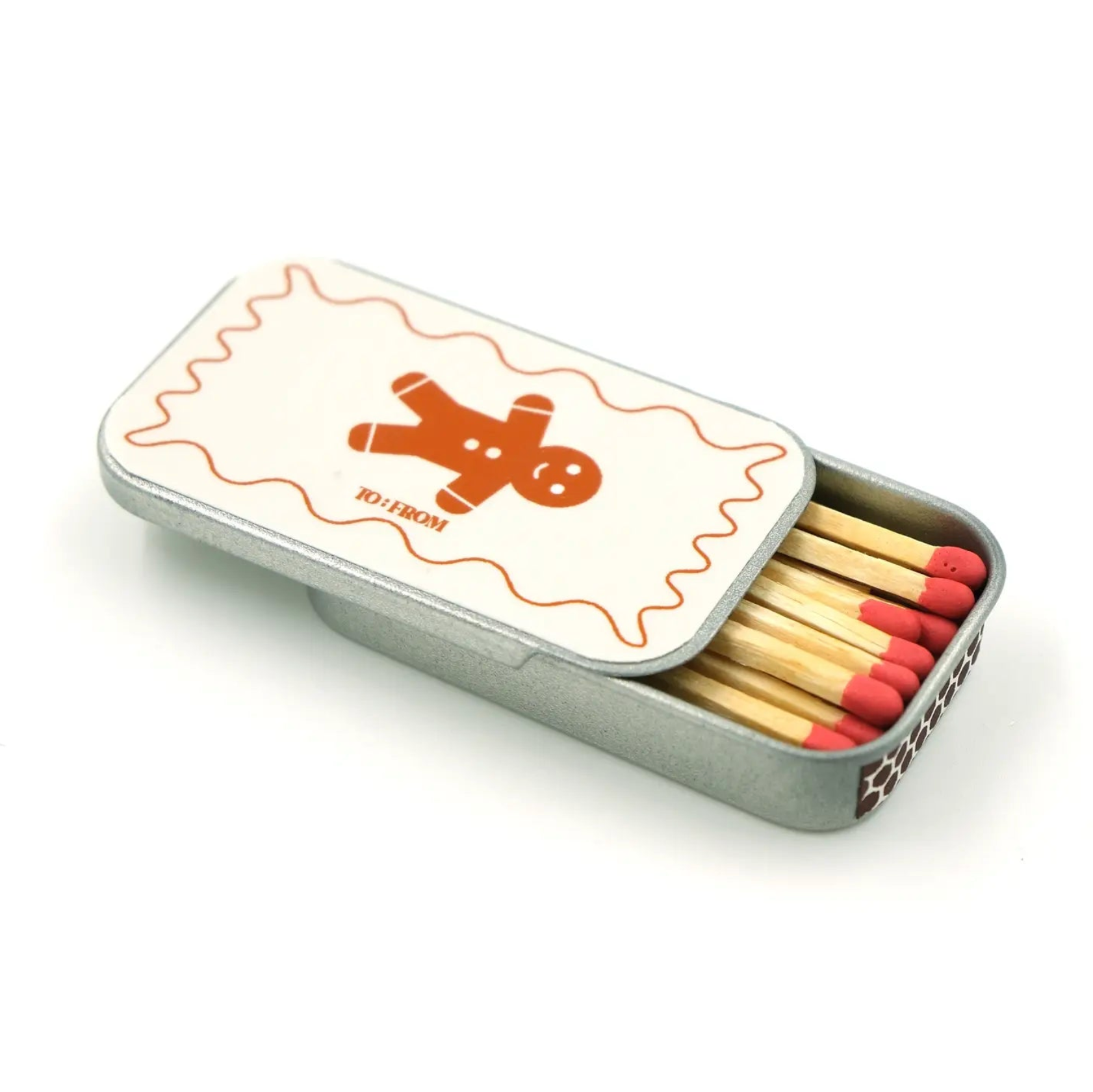 Ginger bread matchbox half open with red matches inside