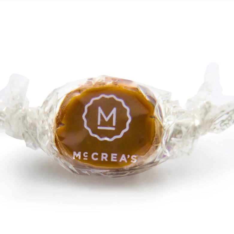 Caramel candy with McCrea's logo on a white background
