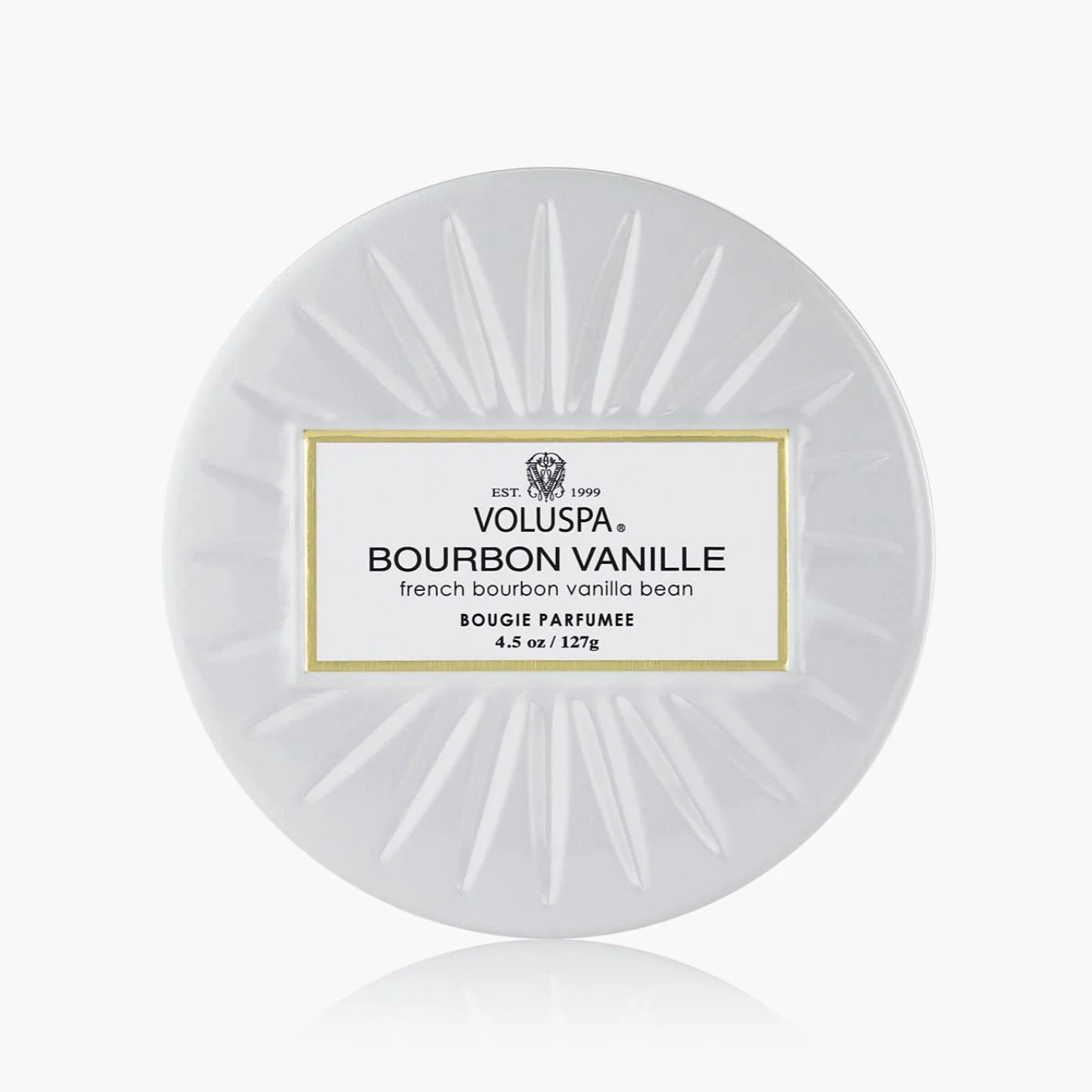 Round Voluspa candle with 'Bourbon Vanille' label on a white background