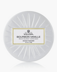 Round Voluspa candle with 'Bourbon Vanille' label on a white background