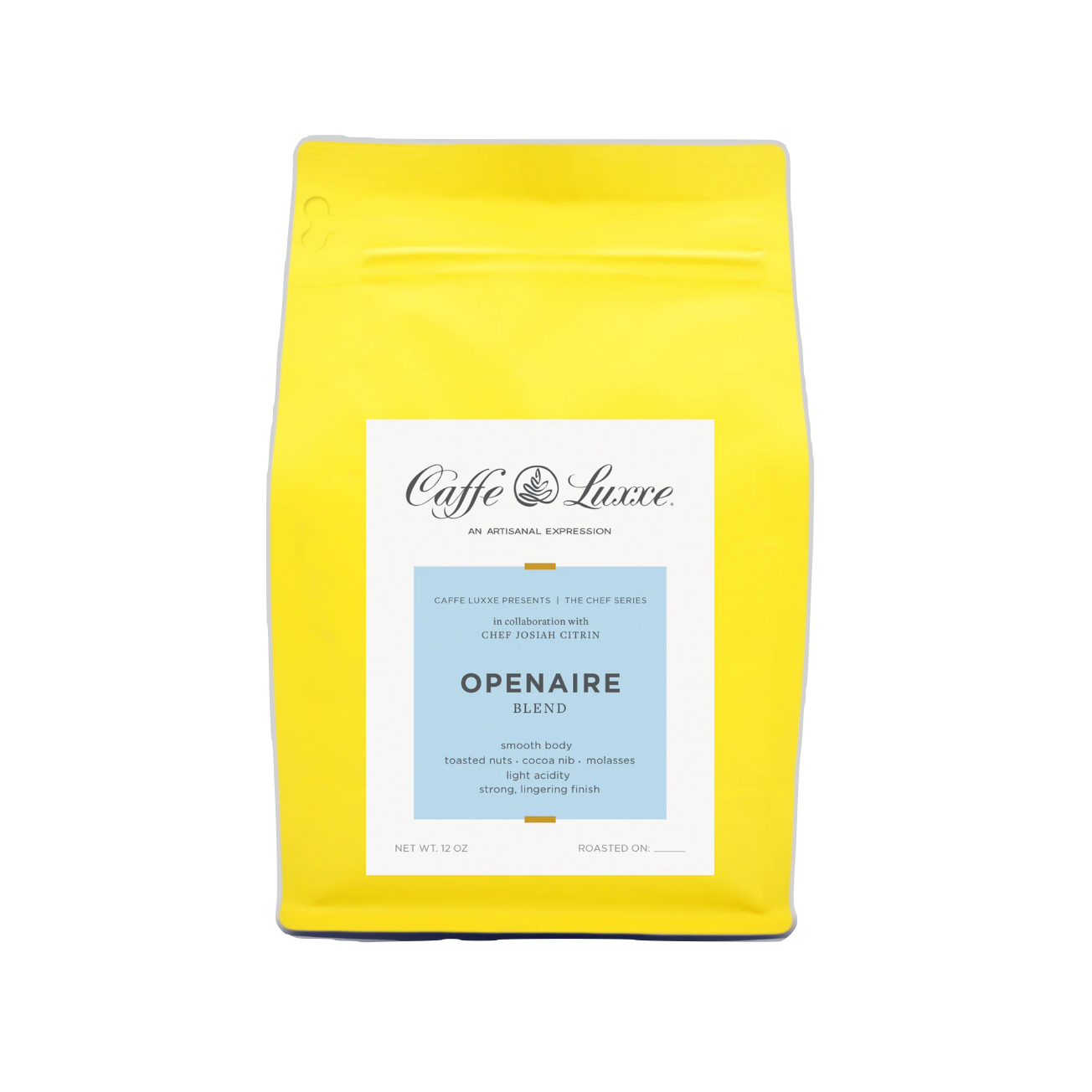 Yellow coffee bag with 'Caffe Luxxe' branding on a white background