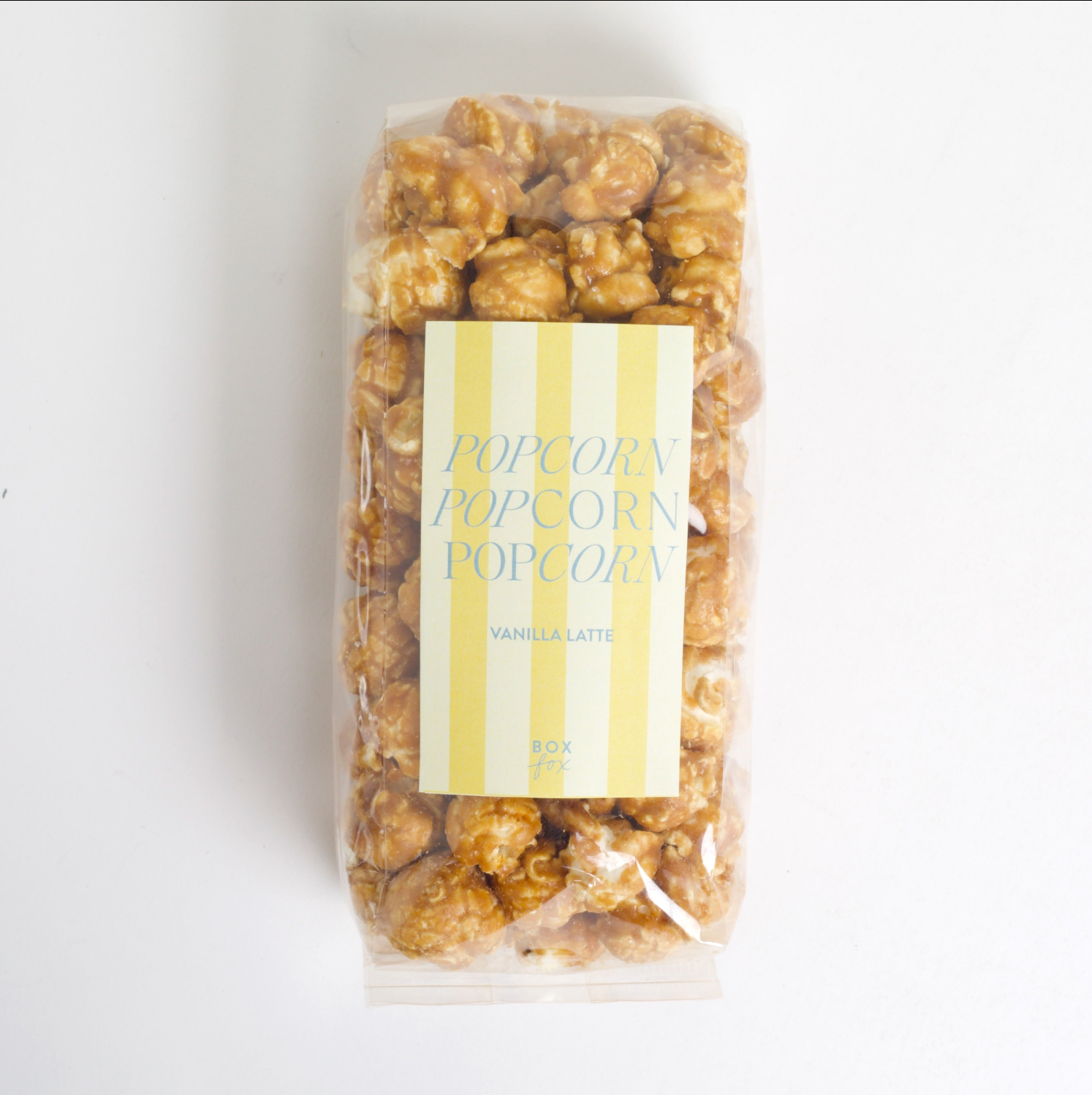 Packaged popcorn with a label on a white background
