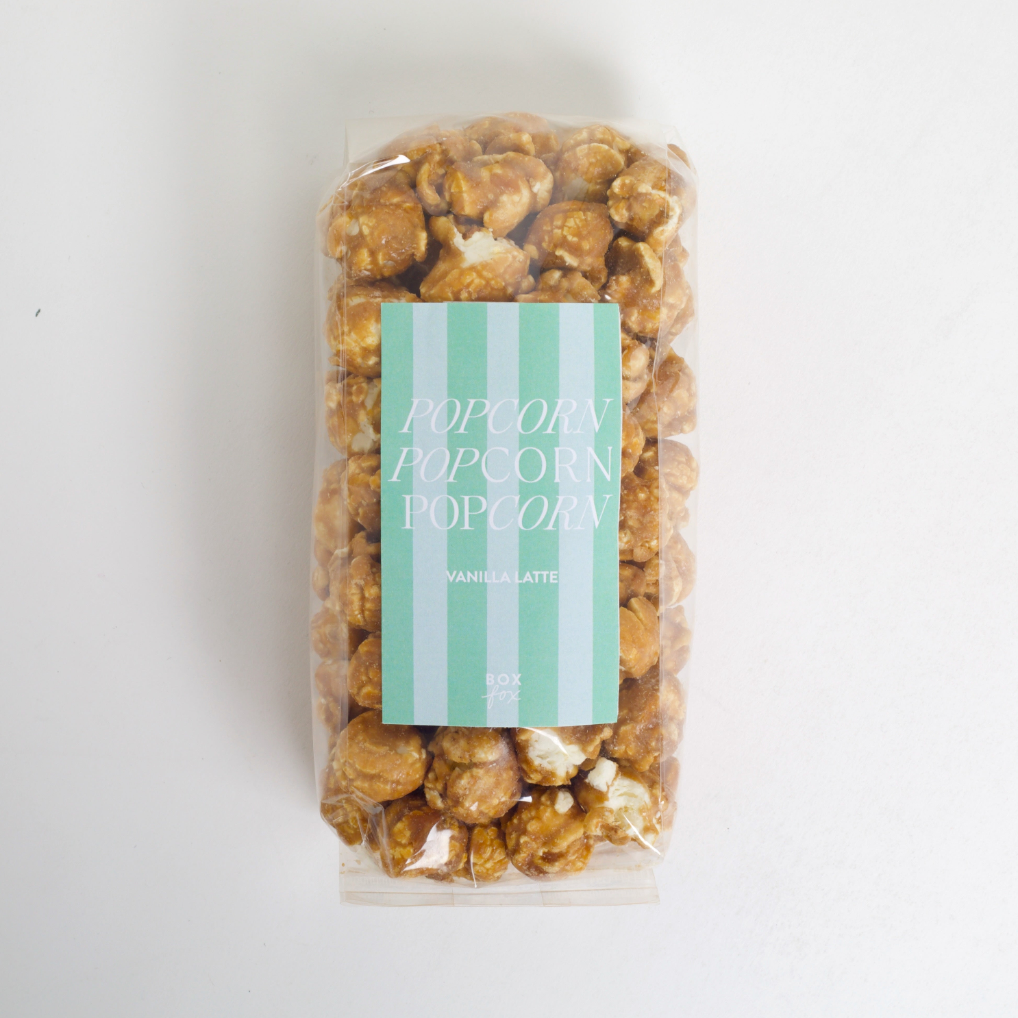 Packaged popcorn with a label on a white background