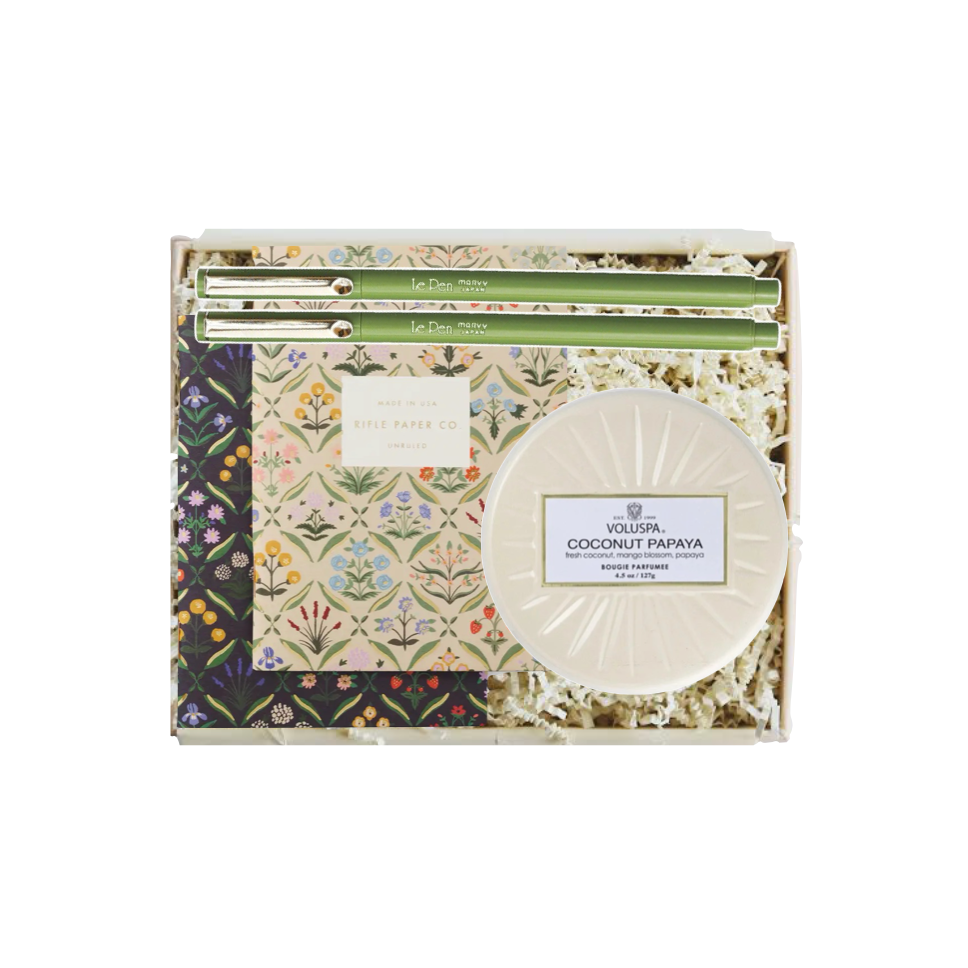 Coconut papaya soap in a decorative box on a white background