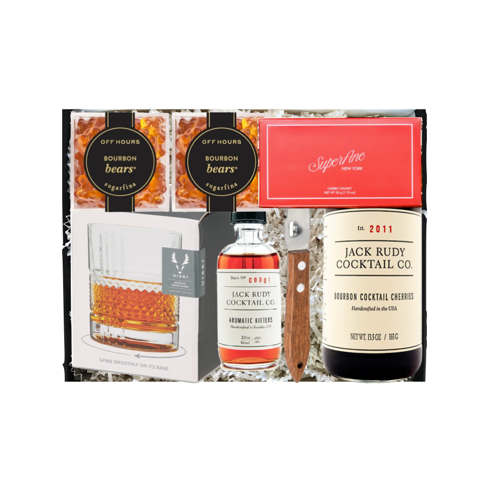 Collection of Jack Rudy cocktail ingredients and packaging on a white background