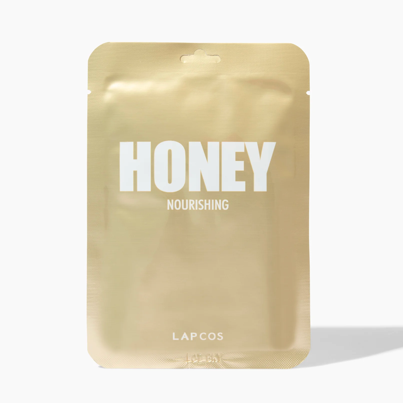 Gold package with 'Honey' and 'LAPCOS' text on a white background