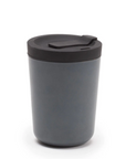 Dark gray tumbler with a lid on a white background
