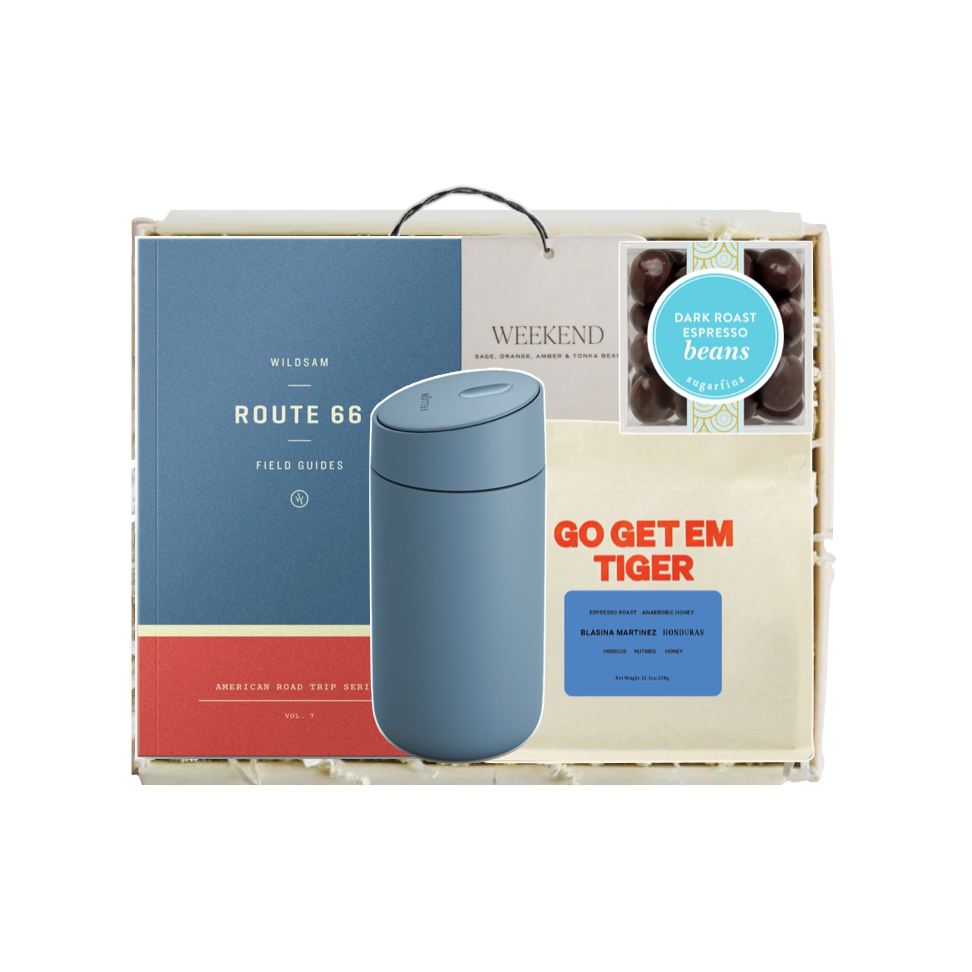 Blue thermos in a packaging box with visible text and graphics.