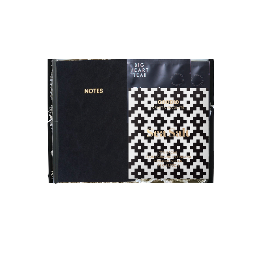 Two notebooks with black and white covers on a white background
