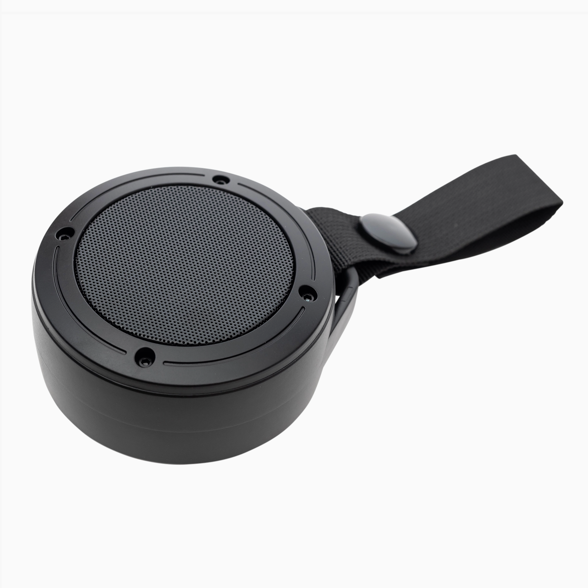 Black portable speaker with a strap on a white background