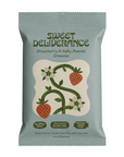 Sweet Deliberance Strawberry & Salty Peanut Granola in a light blue-gray resealable pouch with a cream central label featuring a strawberry vine illustration.