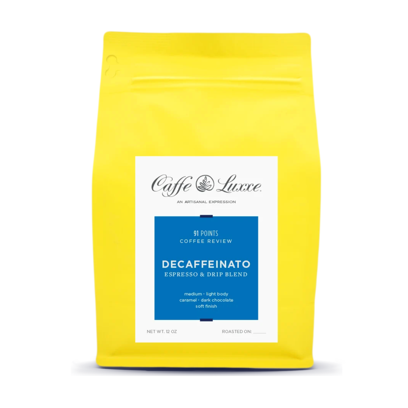 A bright yellow stand-up coffee bag with a white and blue front label reading Caffe Luxe Decaffeinato, centered on a white background.