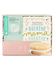 A boxed skincare set from Patchology displayed in a white tray. The set includes a Peppermint Linalool eye gel tube with a mint green label, a pink nipple lip balm tube, and a card that reads 'BREATHE mama BREATHE' with a wooden bristle brush pictured on the front.