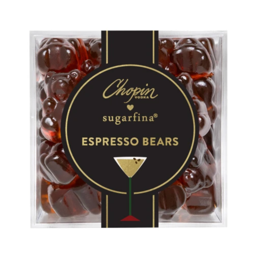A clear square plastic box of Chapin Sugarfina Espresso Bears gummy candies, featuring a black central label with gold lettering and a martini glass graphic.