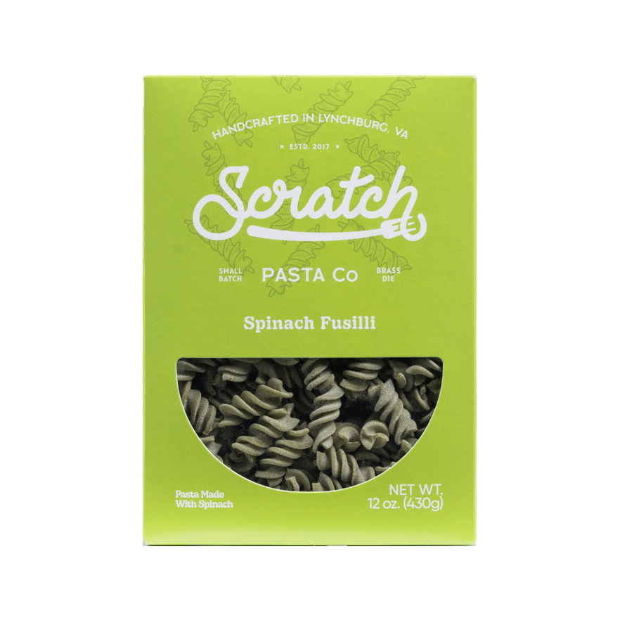 scratch spinach fusili pasta on a white background