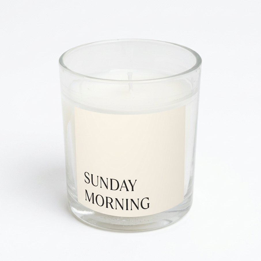 sunday morning candle on a white background