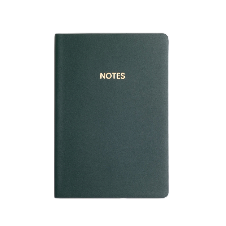 green notebook on a white background