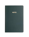 green notebook on a white background