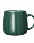 dark green round mug on a white background