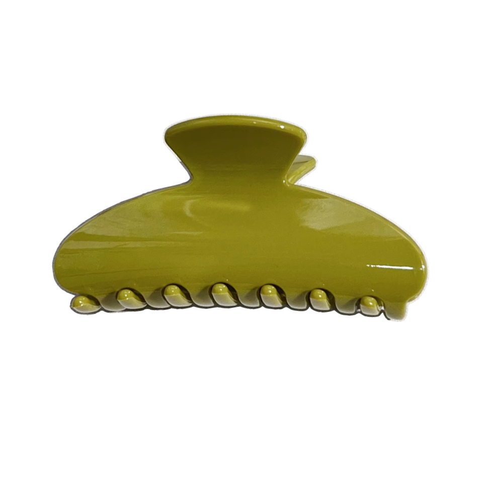 A glossy olive green hair claw clip with a scalloped edge, shown on a plain white background.