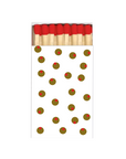 A stylized matchbox illustration on a plain white background, with red match heads, beige wooden matches, and several small red-and-green circular dots printed on the front.