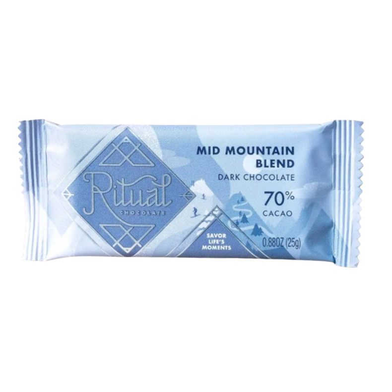 A single wrapped chocolate bar from Ritual Candles, labeled 'Mid Mountain Blend Dark Chocolate 70% Cacao', in a light blue and white foil wrapper against a plain white background.