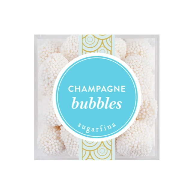 Champagne bubbles candy in a clear square plastic container with a white and light blue circular label reading 'CHAMPAGNE bubbles' and 'sugarfina' below, centered on a white background.