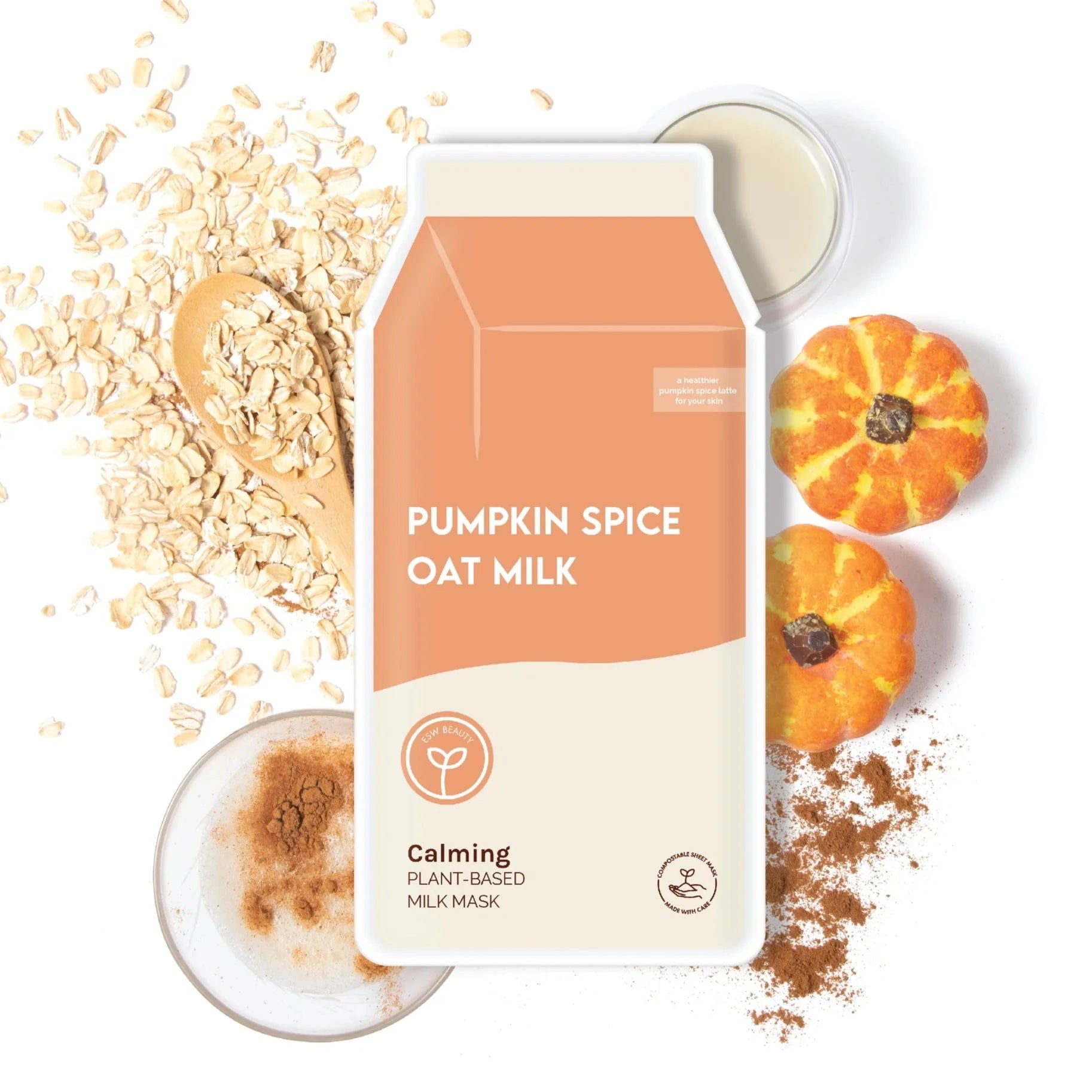 Pumpkin Spice Oat Milk Calming Plant-Based Milk Mask surrounded by oats, pumpkins, cinnamon and cream.