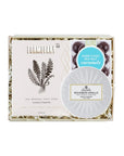 Box of Formulary 55 sea mineral foot soap with a small container of bourbon vanilla caramels on a white background